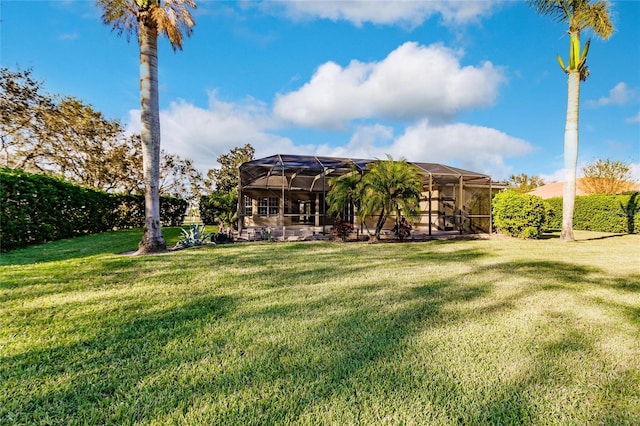 view of yard with a lanai