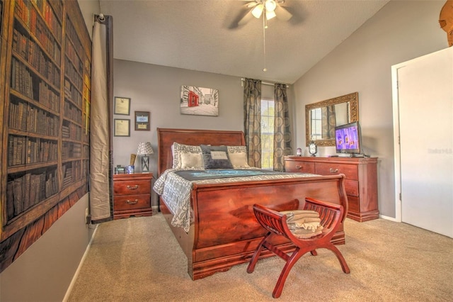 bedroom with ceiling fan, light colored carpet, and lofted ceiling