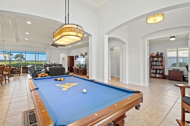 playroom featuring a raised ceiling, ceiling fan, light tile patterned flooring, and pool table