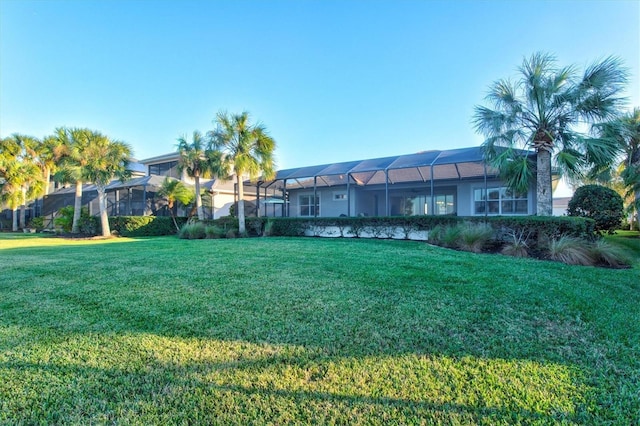 view of yard with a lanai