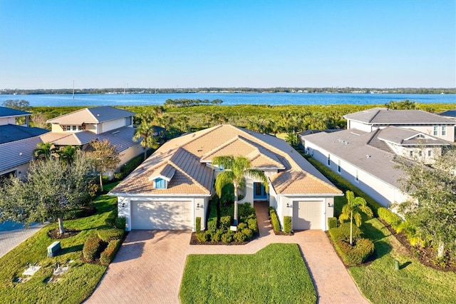 bird's eye view with a water view