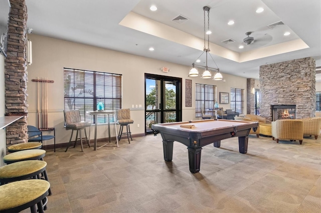 playroom featuring a fireplace, a raised ceiling, ceiling fan, and billiards