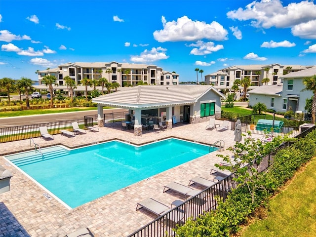 view of pool featuring a patio