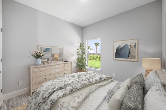 bedroom featuring hardwood / wood-style floors