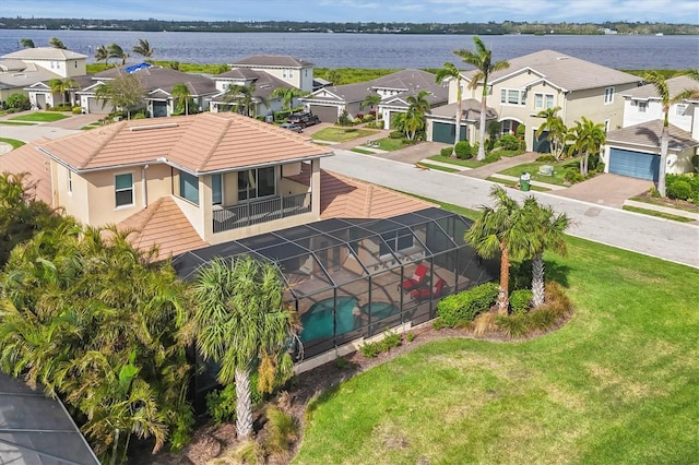 drone / aerial view featuring a water view