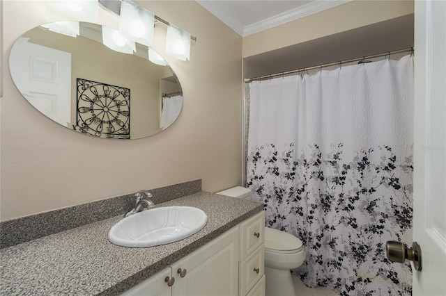 bathroom with vanity, ornamental molding, and toilet