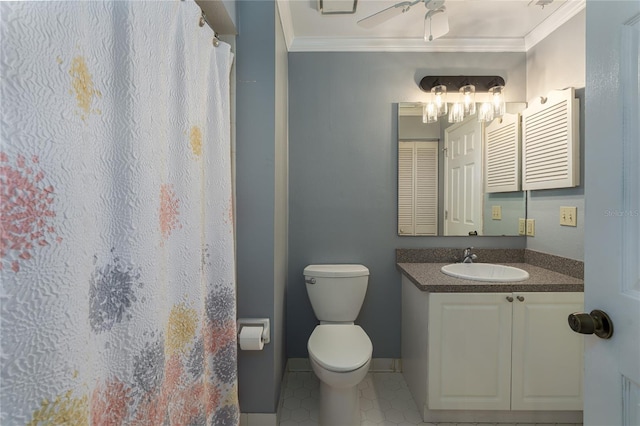 bathroom featuring ornamental molding, toilet, tile patterned floors, and vanity