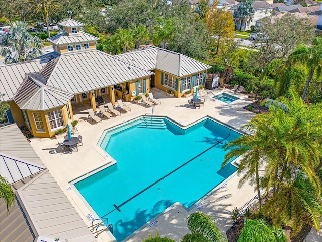 view of pool featuring a patio area