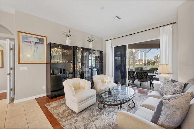 living room featuring tile patterned floors