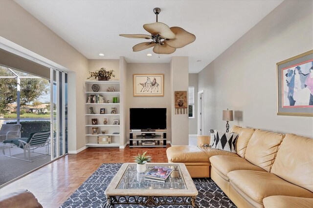 2921 Seasons Blvd, Sarasota, FL 34240 - living area with ceiling fan, baseboards, and recessed lighting