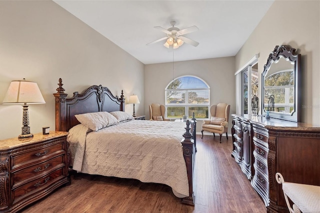 bedroom with dark wood-type flooring and ceiling fan