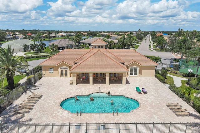 view of swimming pool with a patio area