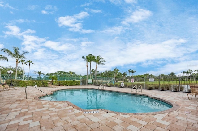 view of pool with a patio area