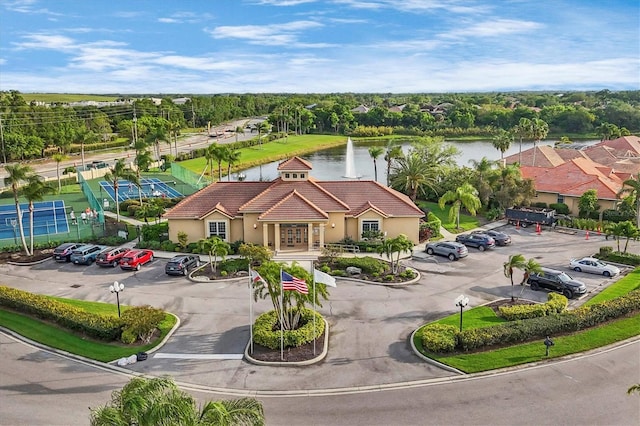 birds eye view of property featuring a water view