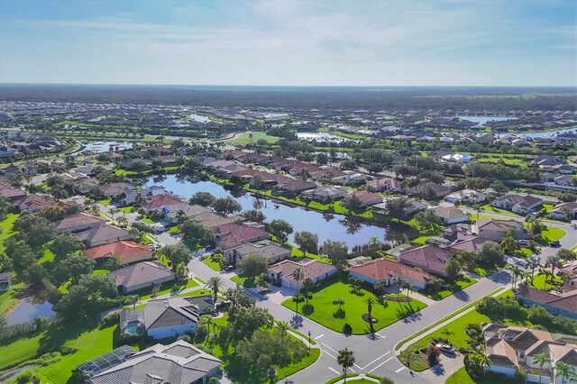 2921 Seasons Blvd, Sarasota, FL 34240 - aerial perspective of suburban area featuring a nearby body of water