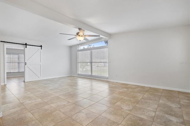 empty room featuring a barn door, ceiling fan, light tile patterned flooring, and lofted ceiling with beams