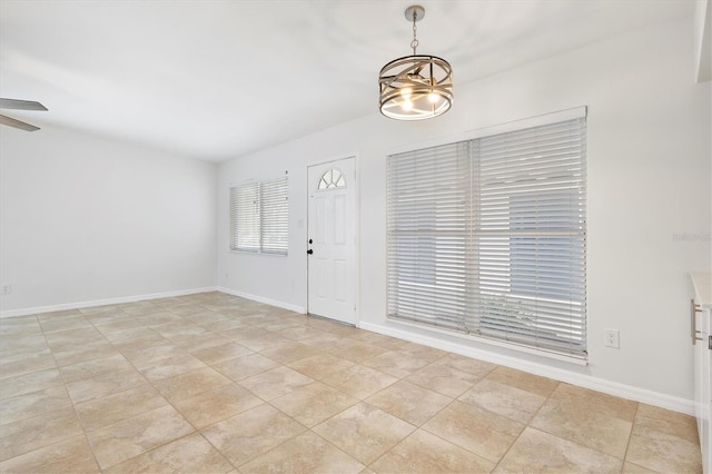 tiled foyer entrance with ceiling fan