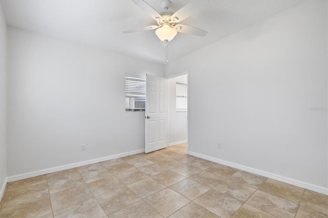 spare room with ceiling fan and cooling unit