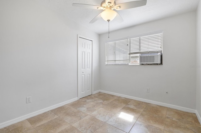 empty room featuring ceiling fan