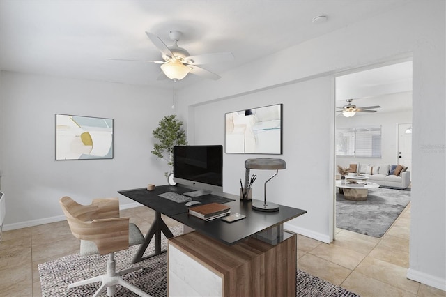 tiled office space with ceiling fan