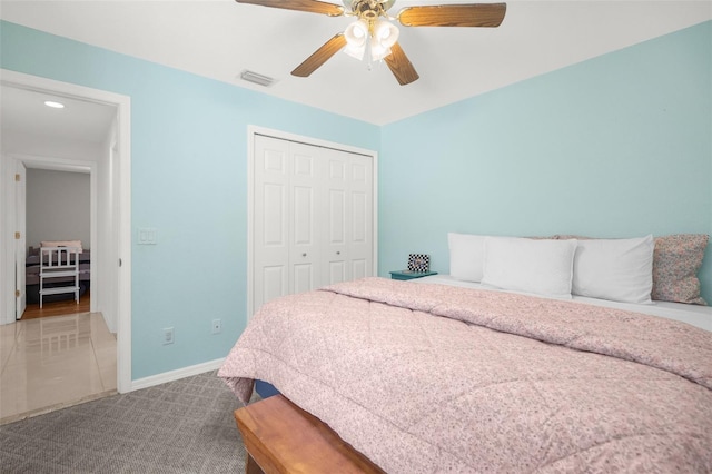 bedroom featuring carpet flooring, a closet, and ceiling fan