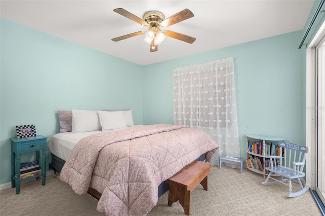 bedroom featuring ceiling fan and light colored carpet