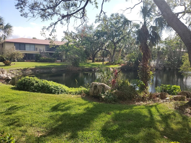 view of yard with a water view