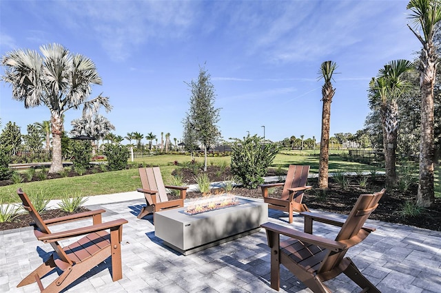 view of patio / terrace with an outdoor fire pit