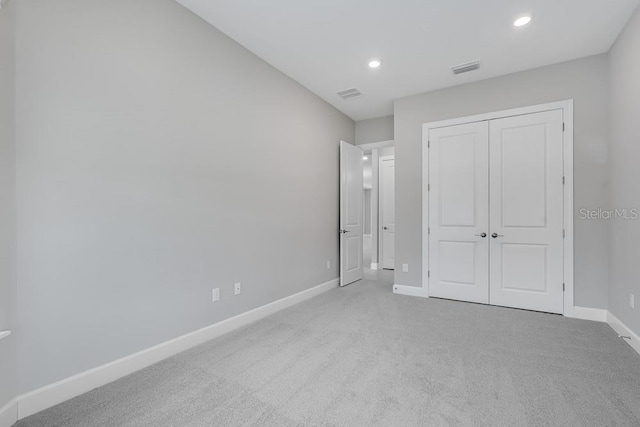 10442 Morning Mist, Sarasota, FL 34241 - unfurnished bedroom with carpet floors, baseboards, recessed lighting, and a closet