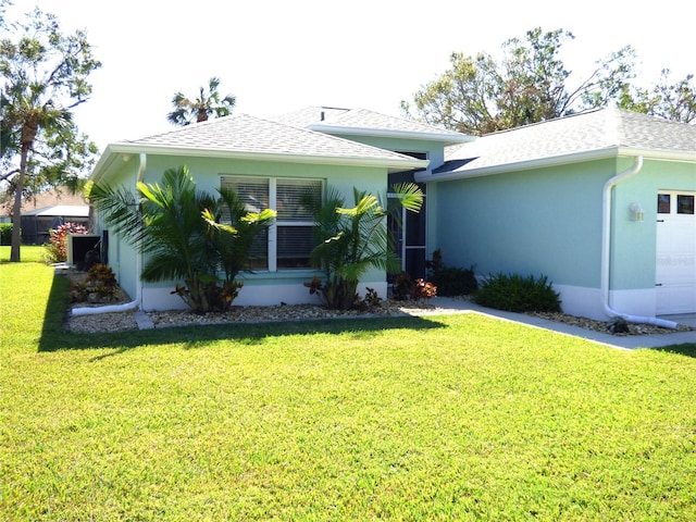 exterior space with a lawn