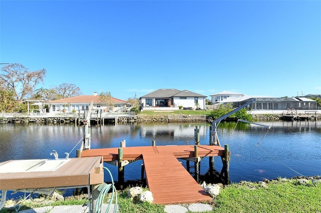 view of dock with a water view