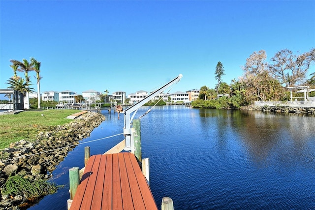 view of dock with a water view