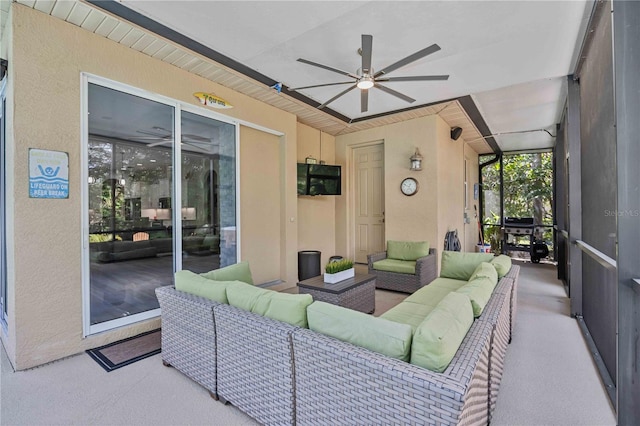 exterior space with ceiling fan and outdoor lounge area