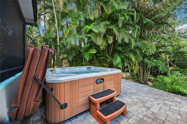 view of patio with a hot tub