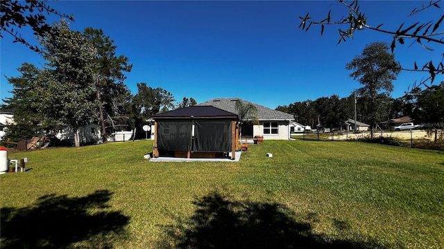 view of yard with a sunroom