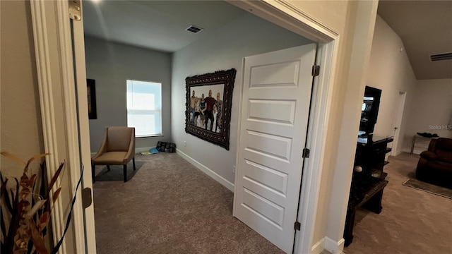 corridor featuring carpet floors