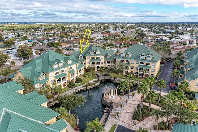 bird's eye view with a water view