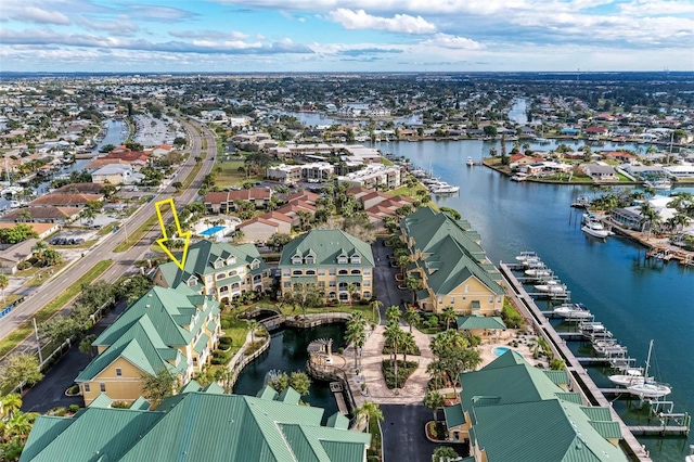 birds eye view of property featuring a water view