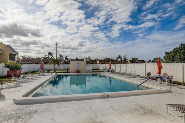 view of pool featuring a patio area