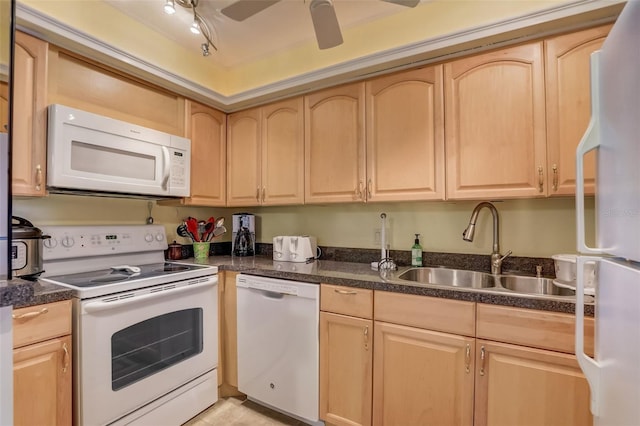 kitchen with ceiling fan, white appliances, sink, and light brown cabinetry