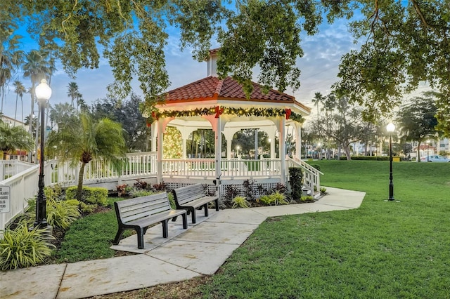 view of property's community featuring a gazebo and a lawn