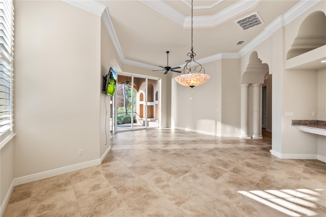 spare room with ceiling fan and ornamental molding