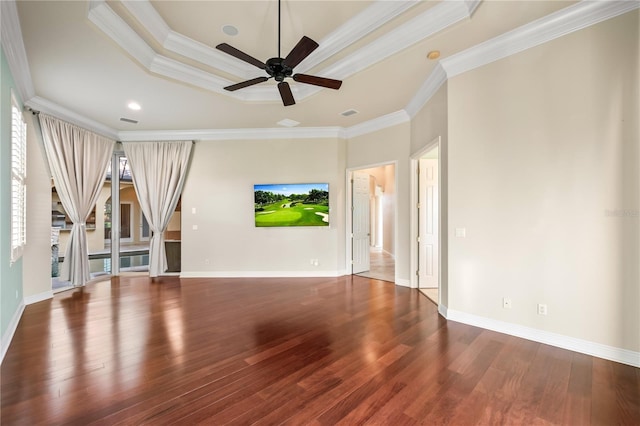 unfurnished living room with hardwood / wood-style flooring, ceiling fan, and ornamental molding