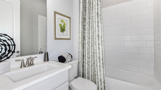 full bathroom featuring shower / bath combination with curtain, vanity, and toilet