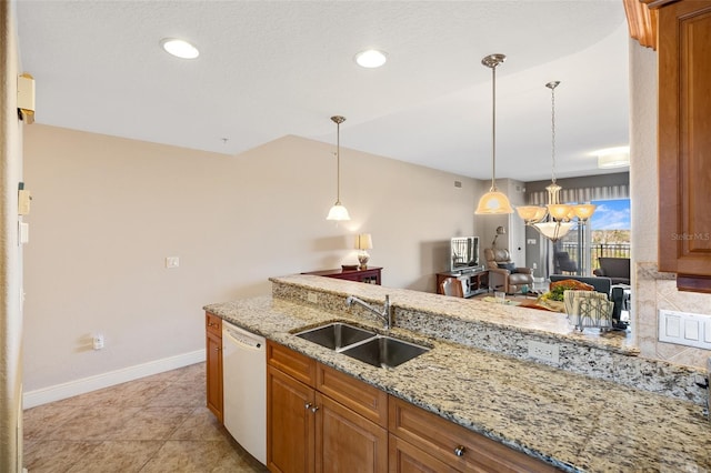 kitchen featuring light stone counters, a sink, baseboards, dishwasher, and brown cabinetry