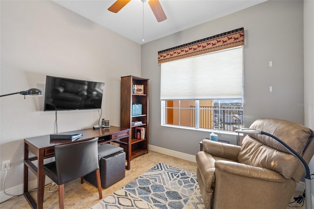 office featuring ceiling fan and baseboards