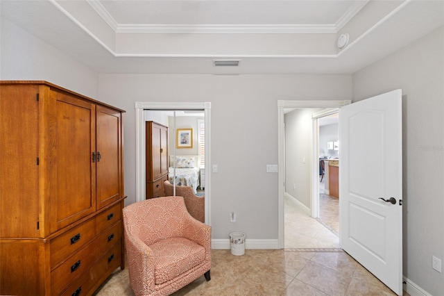 living area with visible vents, a raised ceiling, light tile patterned flooring, and crown molding