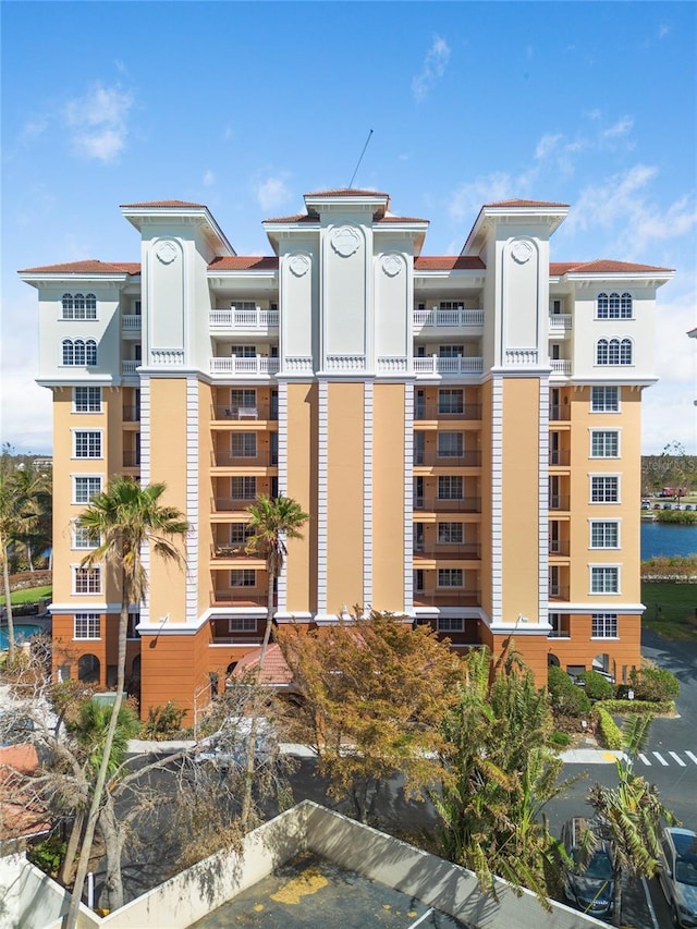 view of building exterior with a water view