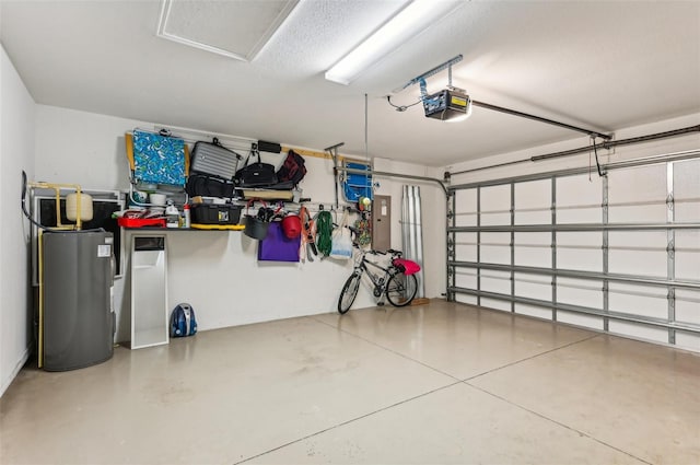 garage with electric panel, a garage door opener, and electric water heater