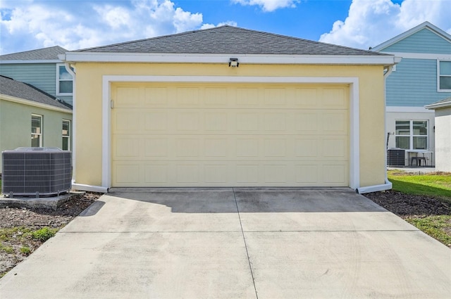 garage featuring central AC unit